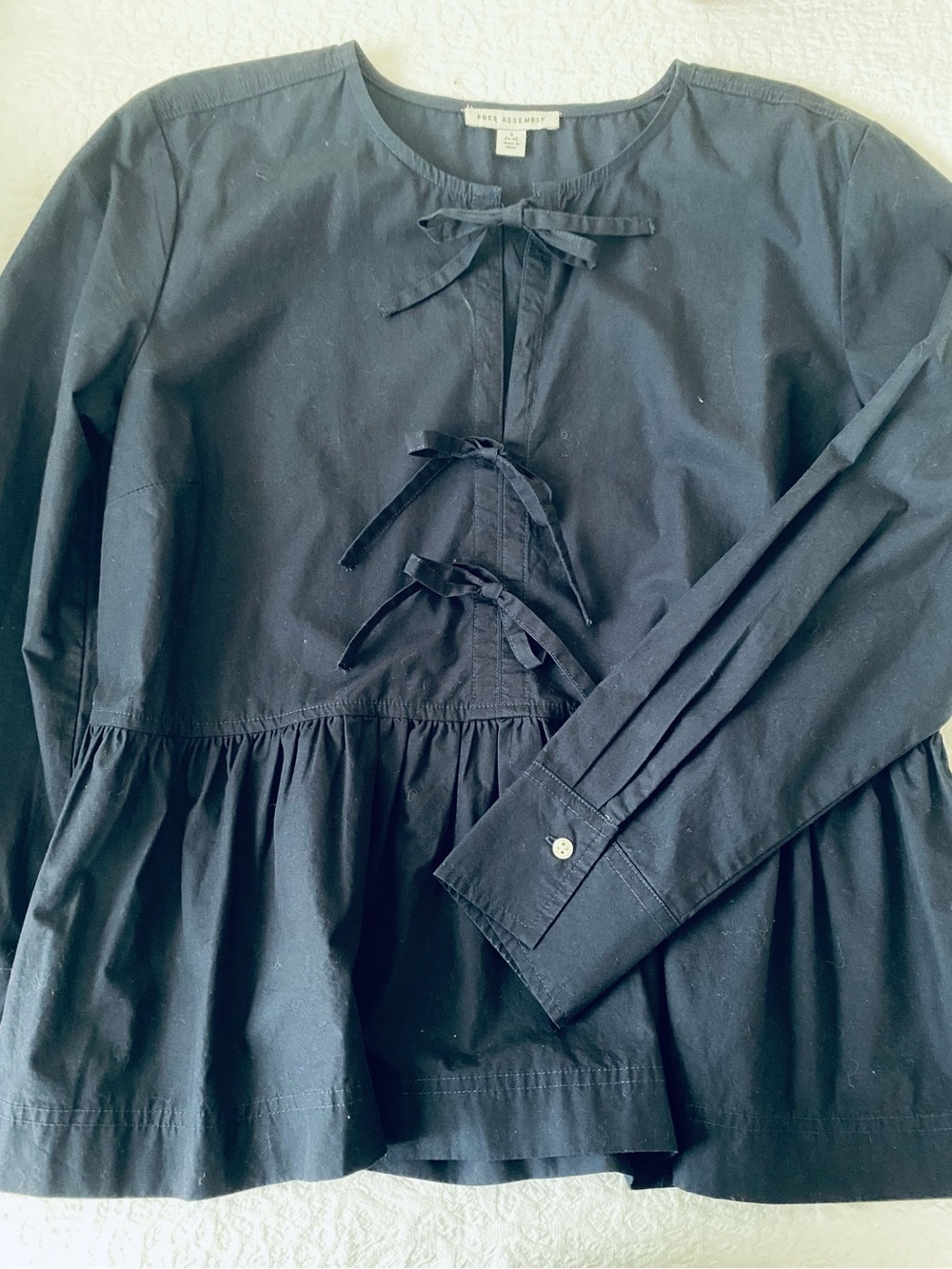 Navy Long-Sleeve Peplum Blouse with Front Bows